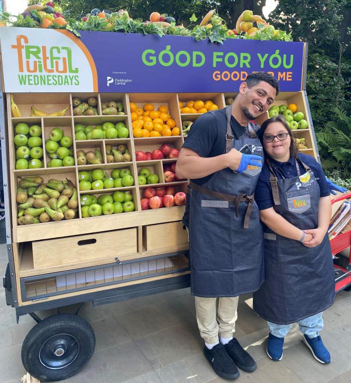 zeina and amine next to fruitful smoothie stand